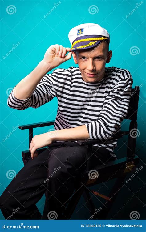 Very Attractive Young Man Model Dressed Like A Sailor Studio Shoot