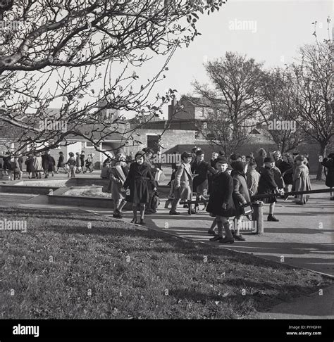 1950s Primary School Children Getting Fresh Air Outside In The