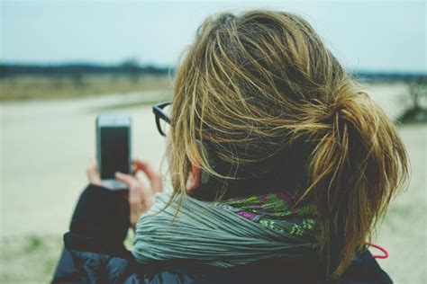 Woman Using White Android Smartphone · Free Stock Photo