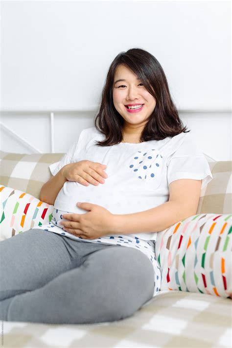 Pregnant Woman Having A Rest On Bed By Stocksy Contributor Maahoo Stocksy