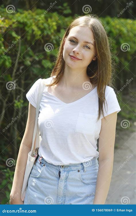 Portrait Of Beautifulblonde Teenage Girl Walking In The Park Smiling Summer Scene Warm Sunny