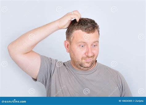 Young Man With Confused Expression Royalty Free Stock Photo Image