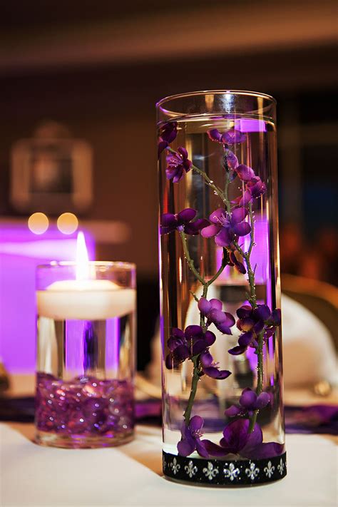 Purple Floating Centerpiece In Cylinder Vase Purple Floating Candles Wedding Centerpieces