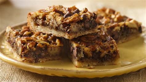These pecan pie bars have caramelized topping on a shortbread crust, for the perfect nut bar. Chocolate Pecan Pie Bars recipe from Betty Crocker