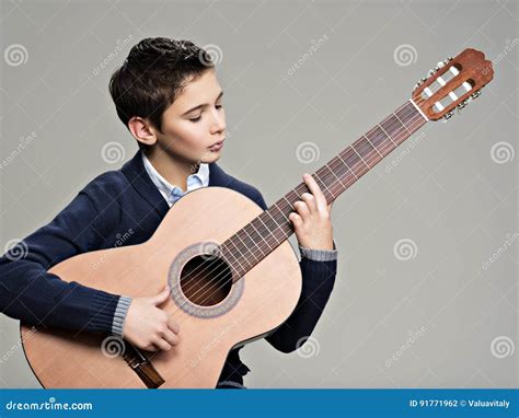 Caucasian Boy Playing On Acoustic Guitar Stock Photo Image Of White