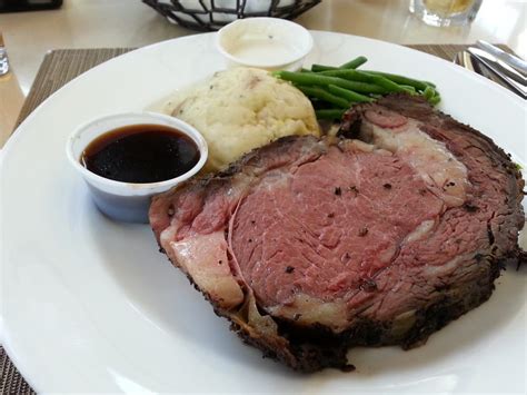 Prime rib roast, rubbed on all sides with black pepper and garlic powder, then drizzled with olive oil and cooked very rare. My Prime Rib Dinner, with garlic mash potatoes, green ...