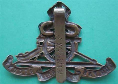 A Royal Artillery Other Ranks Cap Badge Numbered