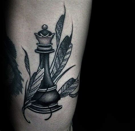 Gentleman With Feathers And King Chess Piece Tattoo On Rib Cage Side Of