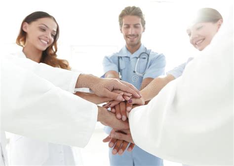Doctors And Nurses In A Medical Team Stacking Hands Stock Photo Image