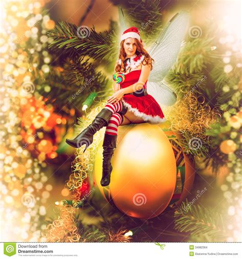 Fairy Christmas Woman On A Decorative Ball Stock Images