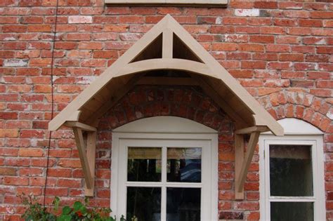 I design small canopies and awnings for 20 psf roof live load unless they are cloth covered (we they attach canopies to brick veneer in my area all the time. Crossmere Oak Door Canopy - Shropshire Door Canopies ...
