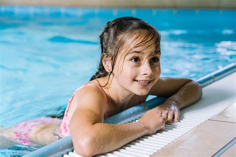 Premium Photo Portrait Teen Girl Having Fun In Indoor Swimming Pool