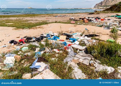 Coastal Degradation With Dirty Beach Rubbish And Domestic Waste
