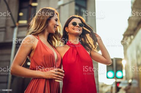 Two Beautiful Women Having Fun On The Street Stock Photo Download