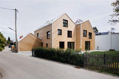 Ifub Designs Pair Of Matching Timber Houses In Munich On Inspirationde