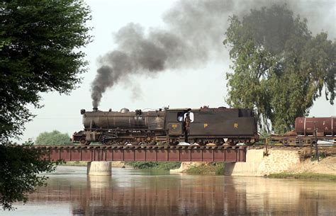 Steam Engine Locomotive Passing A Bridge Near Mirpurkhas Pakistan A
