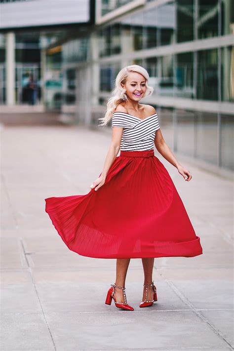 TAKING YOUR RED PLEATED SKIRT OUT