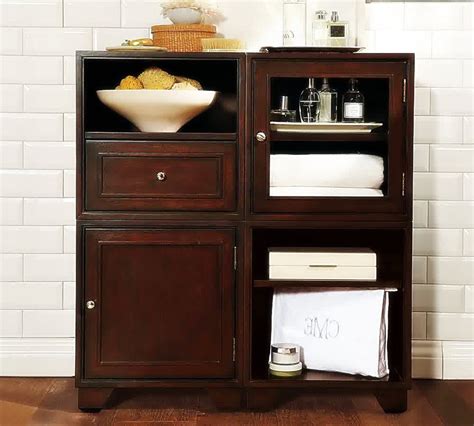 Here this handsome bathroom storage cabinet is made of custom wooden lengths put together precisely for the frame and for the shelving levels! Bathroom Storage Cabinets Floor - Home Furniture Design