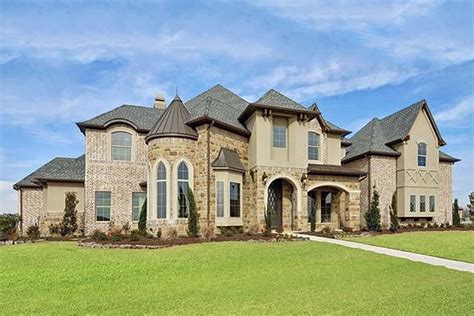 We have house plans with panoramic windows for modern taste. Luxury Chateau-Style House Plan with Main-Floor Master ...
