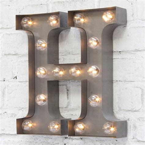 Showcasing the letter of your choice, its steel frame measures just 11.25'' h x 7.5'' w, so it's perfect for shelves and tabletops. carnival letter lights 'a to z' industrial silver by ...