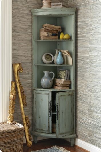 Distressed wood and cast iron handles add a touch of farmhouse appeal to your living space, stylish and functional. Maldives Corner Cabinet - Distressed Cabinet, Pale Green ...