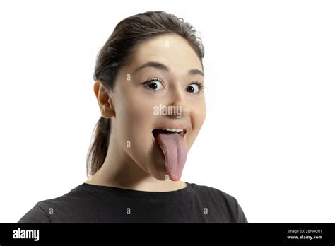 Smiling Girl Opening Her Mouth And Showing The Long Big Giant Tongue Isolated On White