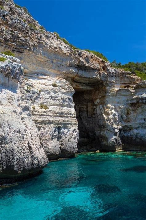 Pirate Coast Cliff Cave At Menorca Island Spain