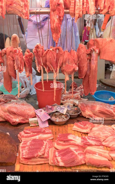 Fresh Meat Hanging At Butcher Shop In Hong Kong Stock Photo Alamy