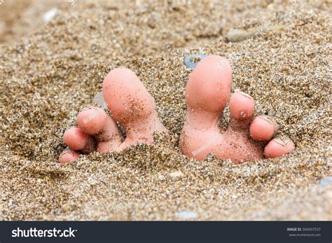 Toes Buried In The Sand Of The Sea On The Beach Foot On The Sand