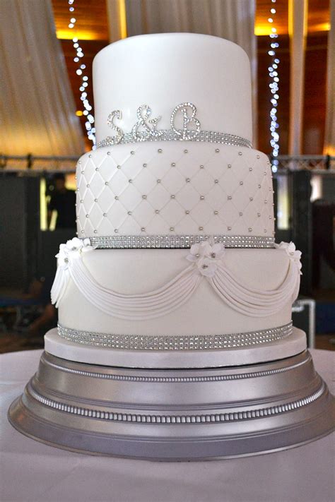 Some phrases could be as easy as congratulations or could more complex like a quote from the bride's favorite movie or book. Diamante and Drapes Wedding Cake - Wedding Cakes - Cakeology