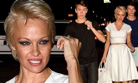 Pamela Anderson Is Flanked By Sons As She Shows Off Cinched Waist In