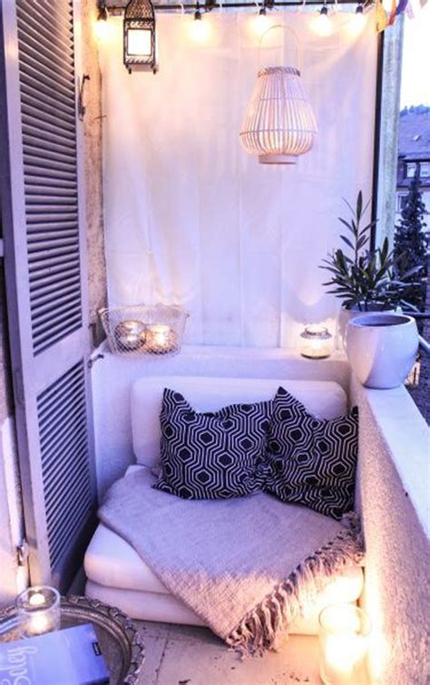 Don't pack the balcony with too much furniture. 15 Small Balcony Lighting Ideas | HomeMydesign
