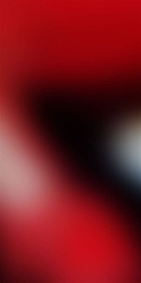 Blurry Image Of Red And Black Colors