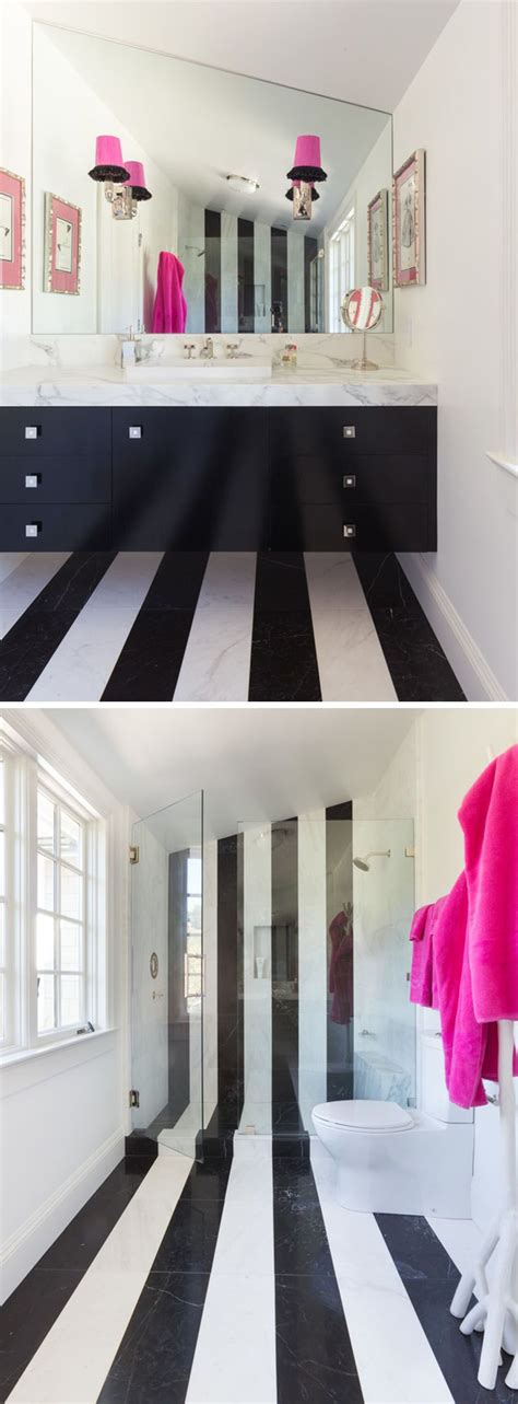 The Black And White Striped Flooring In This Bathroom Travels From