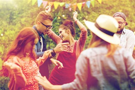 Happy Friends Dancing At Summer Party In Garden Stock Image Image Of