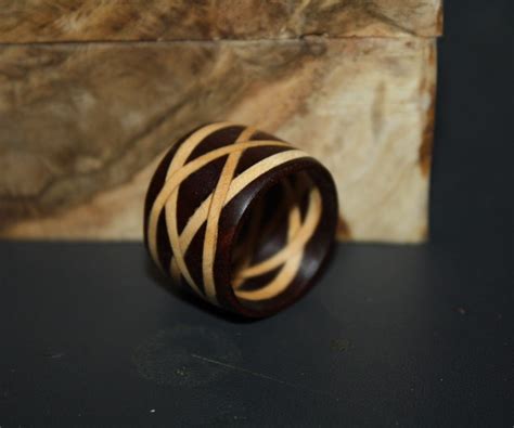 They're roduced using fresh wood, resin, and beeswax. Laminated Celtic Knot Wooden Ring | Wooden rings, Wood rings, Wooden diy