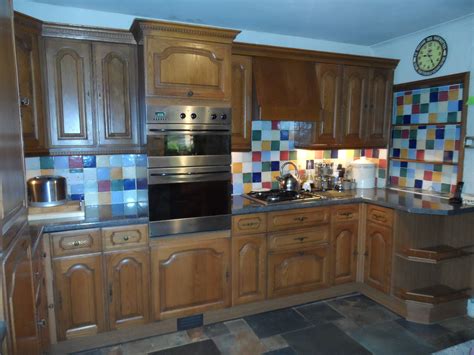 We spray & repaint your cabinet doors to make them look new again. Spray painting kitchen cabinet doors in Gloucestershire