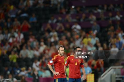 Spanish Midfielders Andres Iniesta And Xavi Hernandez Wait For The News Photo Getty Images