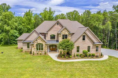 Custom Built Brick And Stone Estate Home In A Peaceful Setting