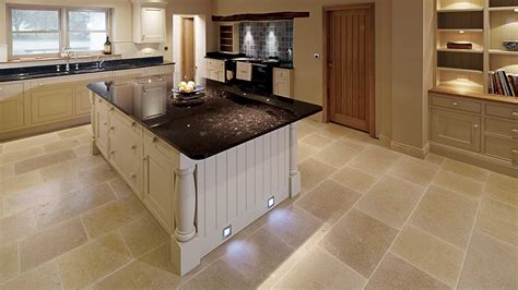 A white kitchen with black granite can work for a variety of design styles and provide excellent contrast and visual interest. 10 Advantages of Black Quartz Kitchen Worktops - SurfaceCo
