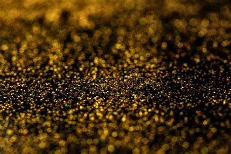 Shiny Gold Glitter On Dark Background Stock Photo Image Of Decor