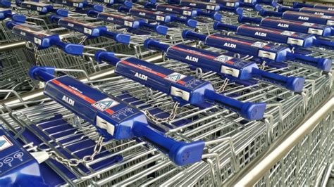 New Aldi Shopping Carts In A Row Stock Photo Download Image Now Istock