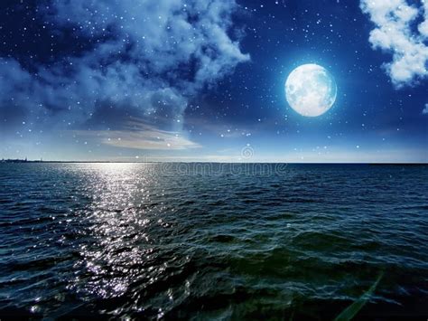 Moon And Starry Sky Sunset At Sea Gold Pink Cloudy Skyline And Water