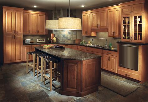 Brass accents including the pendant lights and cabinet handles add a layer of luxury. Top 3 Things to Look for In Cabinet Construction