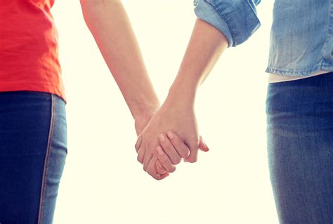 Close Up Of Lesbian Couple Holding Hands Louadvokatfirmadk
