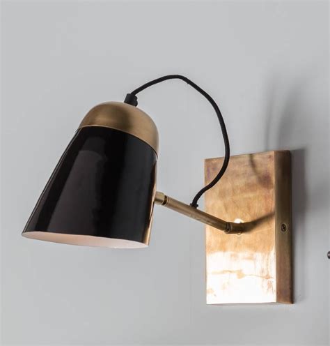Are You Interested In Our Black Wall Lights With Our Brass Wall Light