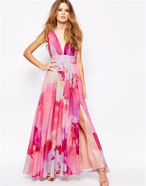 Turn heads at the summer nuptials you're invited to when you opt this floral maxi dress is easy and breezy, making it a great option for a beach wedding. Lyst - Fame & Partners Valencia Pleated Maxi Dress With ...