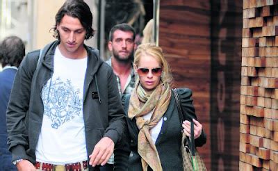This zlatan ibrahimovic photo might contain street, city scene, and urban setting. sports: Zlatan ibrahimo wife helena seger 2013