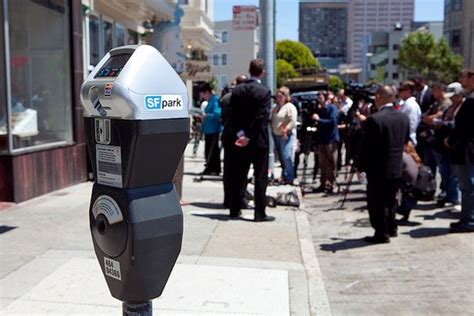 Best of all, there's no charge for the charge! San Francisco rolls out new smart parking meters with ...