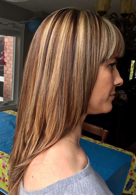 Blonde Highlights With Caramel And Dark Chocolate Brown Low Lights